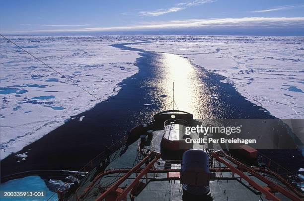 nuclear powered icebreaker following lead towards north pole - ice breaker stock pictures, royalty-free photos & images