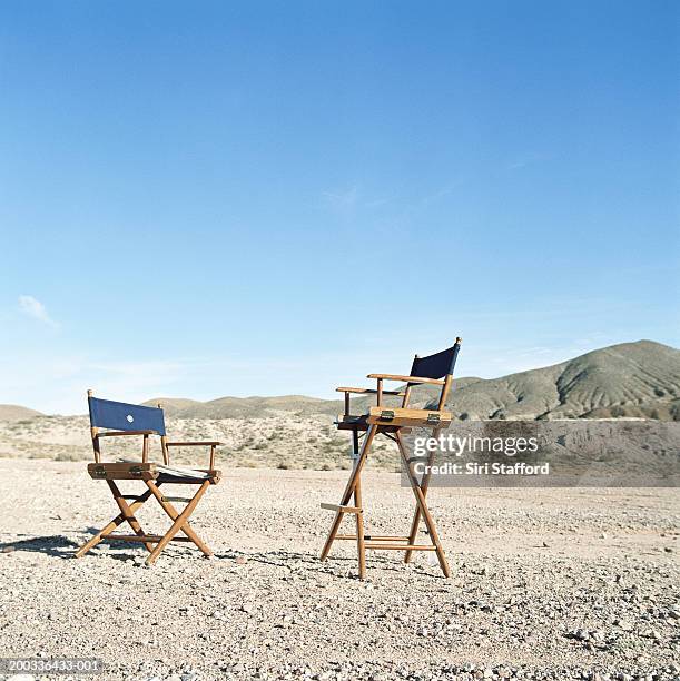 director's chairs in desert - director's chair stock pictures, royalty-free photos & images