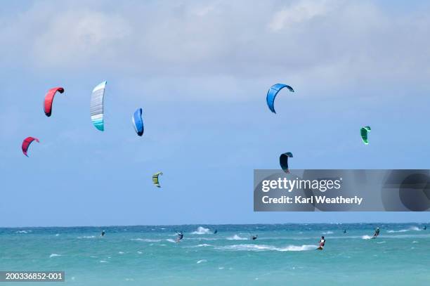 usa, hawaii, maui, people kitesurfing - maui water stock pictures, royalty-free photos & images