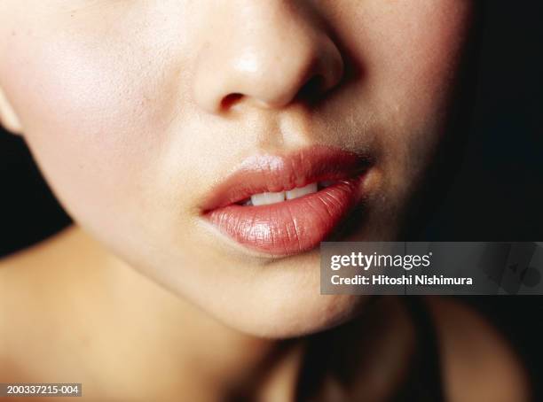 young woman, close-up of lips, mid section - rumpf eines tieres stock-fotos und bilder