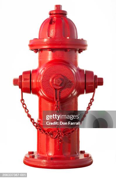 red fire hydrant on white background - hydrant stock-fotos und bilder