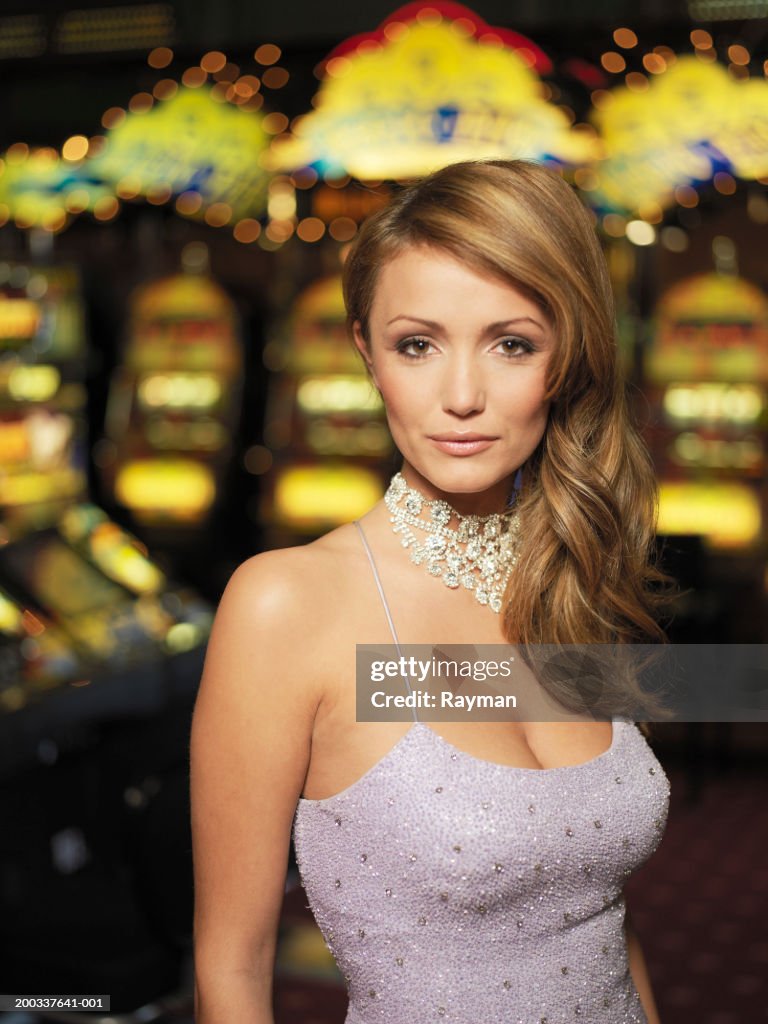 Woman in casino, smiling, portrait