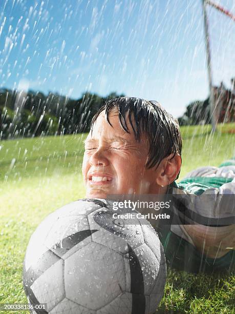 Football Rising And Falling 638 Kid Football Rain Stock Photos, High-Res Pictures, and Images ...