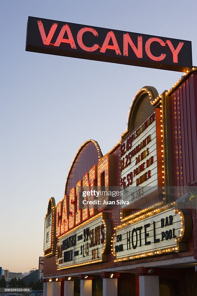 USA, Nevada, Las Vegas, casino with vacancy sign, sunrise