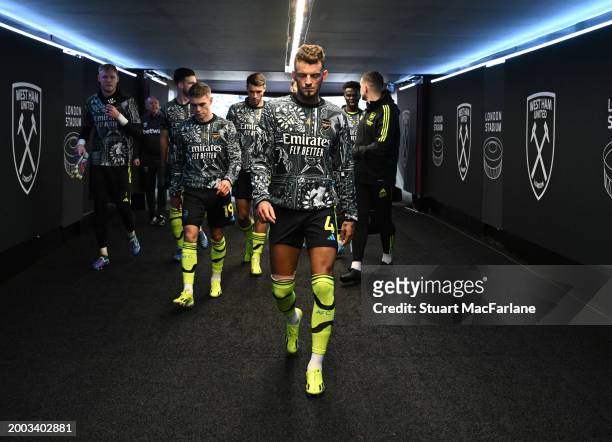 Arsenal defender Ben White walks back to the away changing room after warm up before the Premier League match between West Ham United and Arsenal FC...