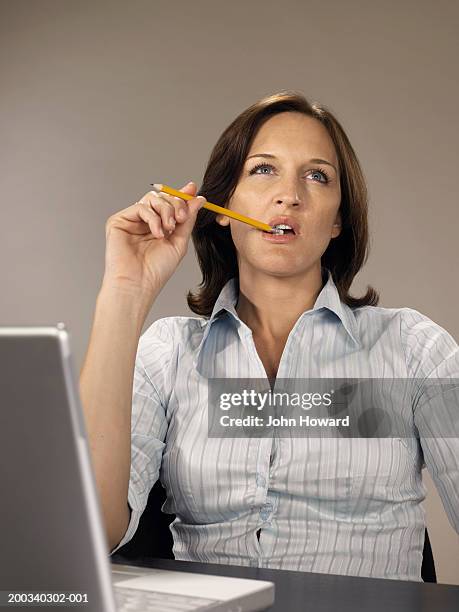 Lady Biting Computer 227 Women Biting Laptops Stock Photos, High-Res Pictures, and Images ...