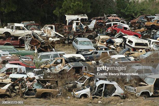 cars in scrap yard, elevated view - abandoned car stock pictures, royalty-free photos & images