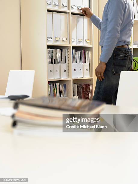 Man Using File 269 Man Searching Cabinet Stock Photos, High-Res Pictures, and Images ...