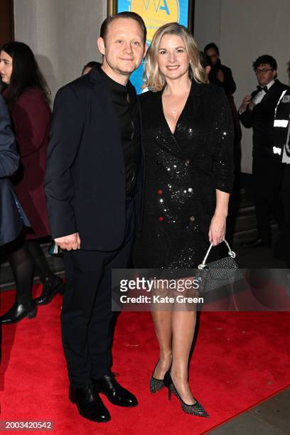 Michael Jibson and guest attend the WhatsOnStage Awards 2024 at the London Palladium on February 11, 2024 in London, England.