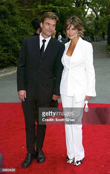 Lisa Rinna and Harry Hamlin arrive at a party hosted by mayor Michael Bloomberg to celebrate the 30th Annual Daytime Emmy Awrds May 15, 2003 at...