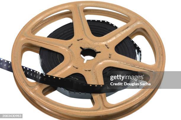 film reel on white background - 8mm film projector stock pictures, royalty-free photos & images