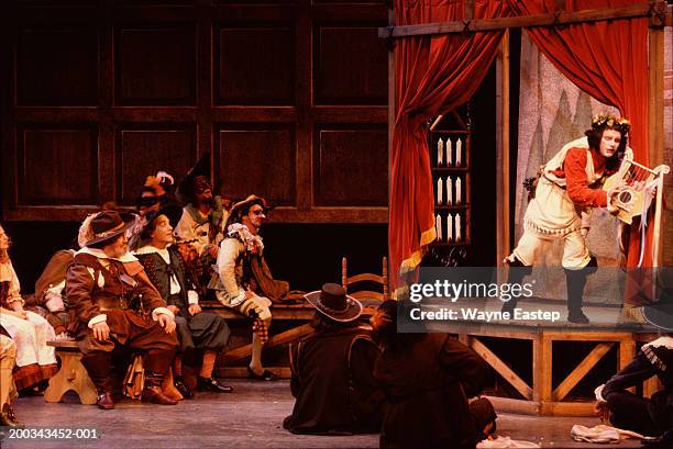 actors performing scene from cyrano de bergerac - theatre performer stockfoto's en -beelden