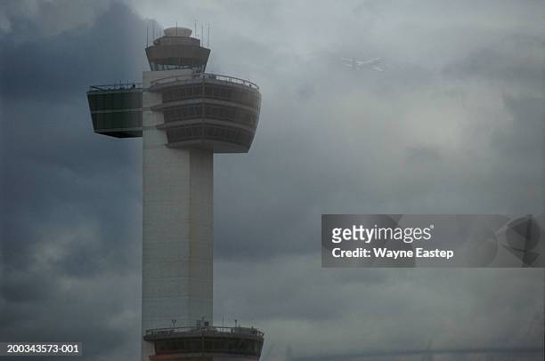 air traffic control tower, aircraft departing in background - kennedy airport bildbanksfoton och bilder