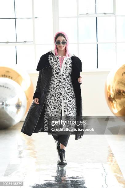 Model walks the runway wearing BELIEVE by tuula rossi with Meghan Jean Jewelry, bags by Suave Suede, and Aderiyike London accessories during Flying...