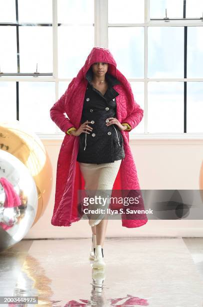 Model walks the runway wearing BELIEVE by tuula rossi with Meghan Jean Jewelry, bags by Suave Suede, and Aderiyike London accessories during Flying...