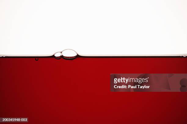 red wine with bubbles on top - red wine stock pictures, royalty-free photos & images