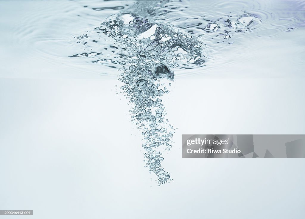 Bubbles rising in water