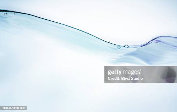 bubbles on water surface - surface fotografías e imágenes de stock