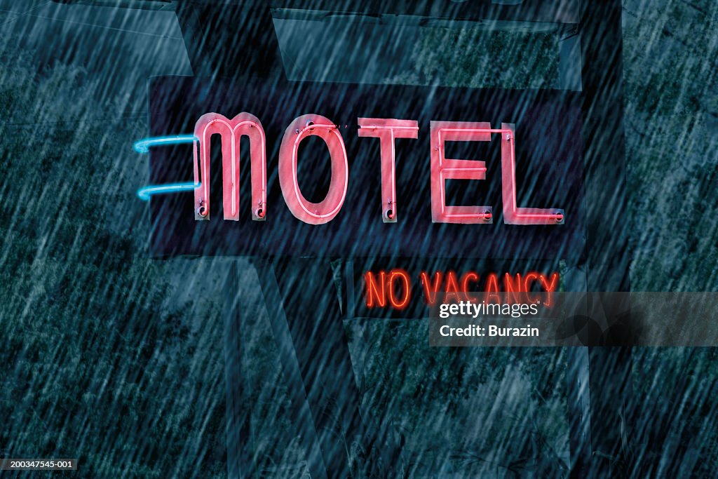 'Motel' and 'No Vacancy'  sign in rain