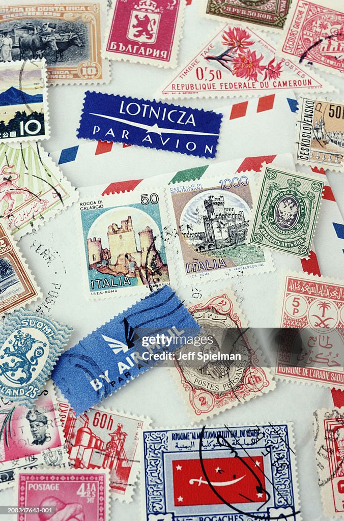 Assorted stamps from various countries, overhead view