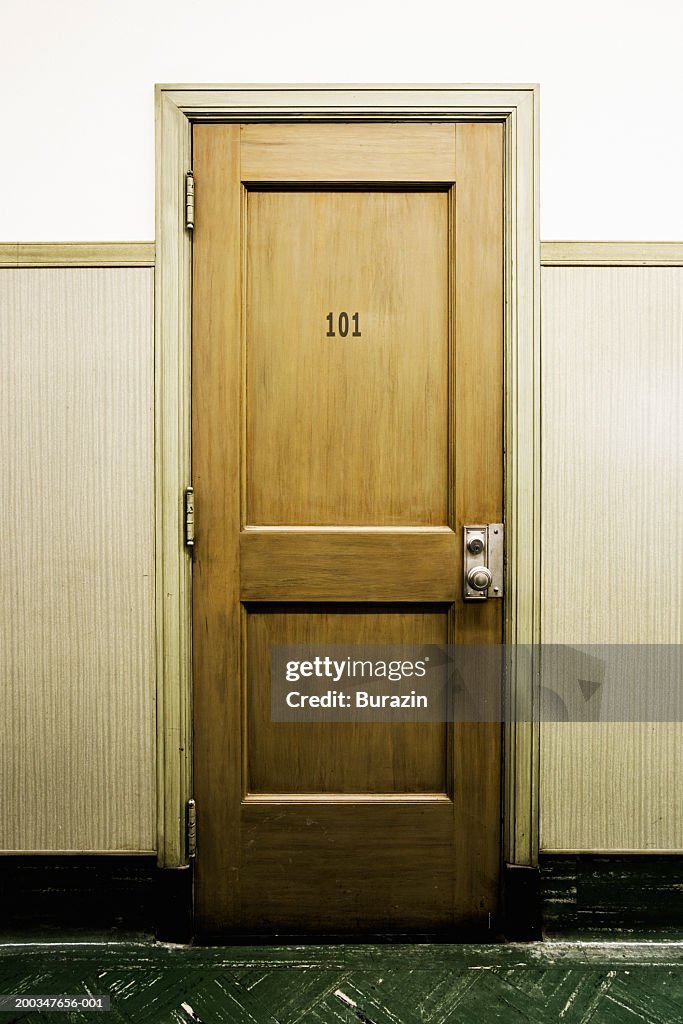 Number '101' sign on door