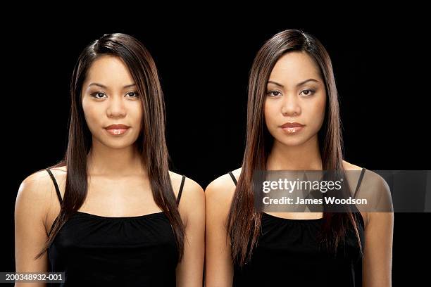 290 Identical Asian Twins Stock Photos, High-Res Pictures, and