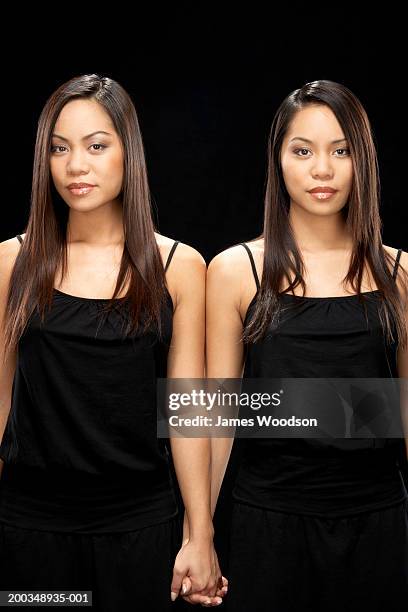 twin sisters, portrait - double facepalm stock pictures, royalty-free photos & images
