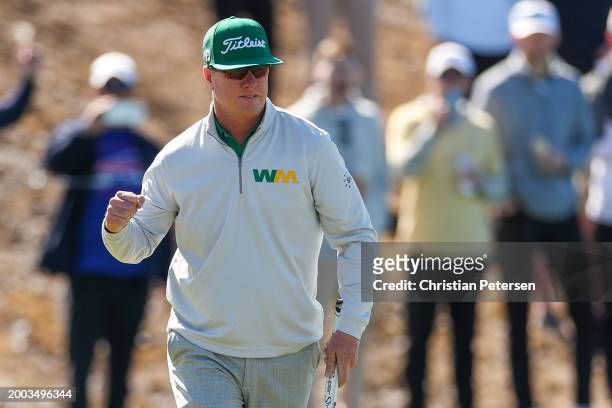 Charley Hoffman of the United States reacts after putting on the sixth green during the final round of the WM Phoenix Open at TPC Scottsdale on...