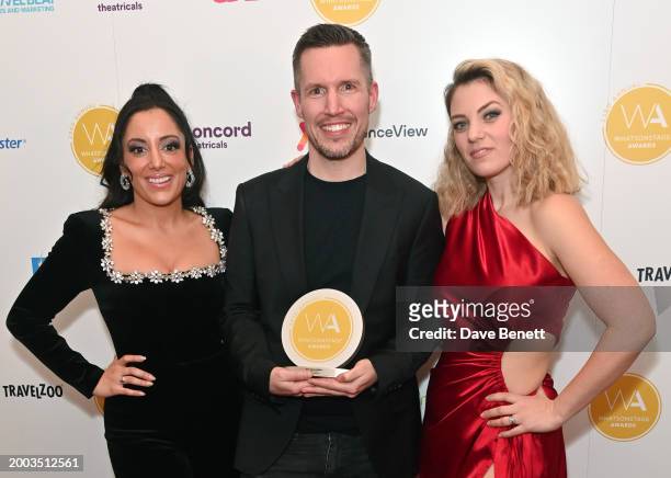 Hiba Elchikhe, Adam Fisher and Joanna Woodward pose in the Winners Room at The 24th Annual WhatsOnStage Awards 2024 at The London Palladium on...