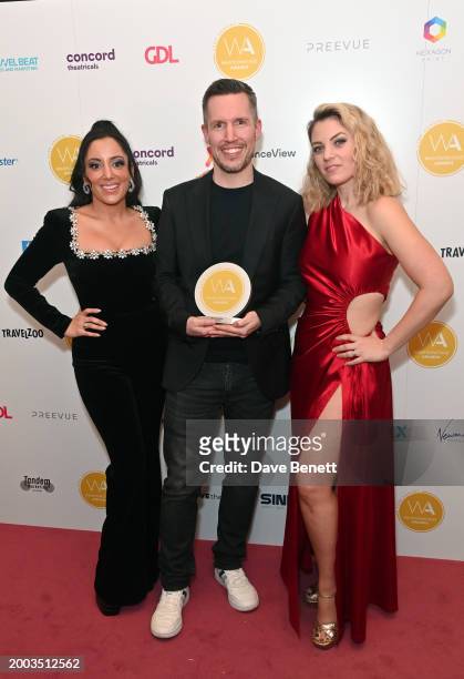 Hiba Elchikhe, Adam Fisher and Joanna Woodward pose in the Winners Room at The 24th Annual WhatsOnStage Awards 2024 at The London Palladium on...