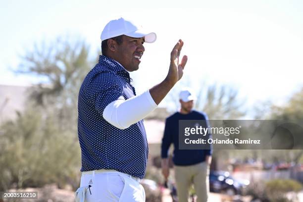 Jhonattan Vegas of Venezuela waves on the fourth green during the final round of the WM Phoenix Open at TPC Scottsdale on February 11, 2024 in...