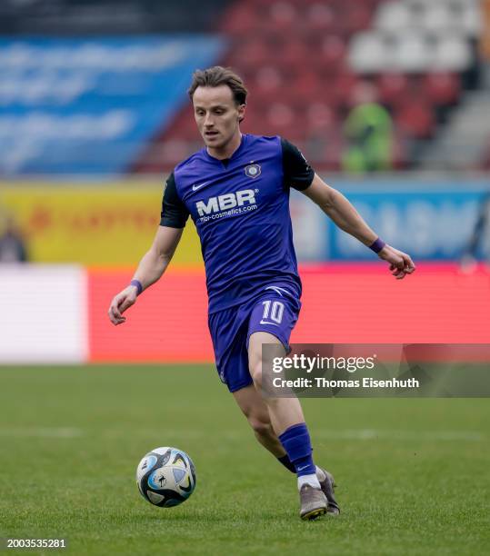 Mirnes Pepic of Aue controls the ball during the 3. Liga match between Hallescher FC and Erzgebirge Aue at Leuna-Chemie-Stadion on February 11, 2024...