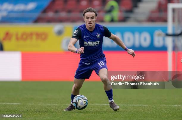 Mirnes Pepic of Aue controls the ball during the 3. Liga match between Hallescher FC and Erzgebirge Aue at Leuna-Chemie-Stadion on February 11, 2024...