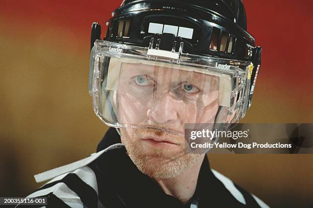 hockey referee wearing helmet, close-up - helmet visor stock pictures, royalty-free photos & images