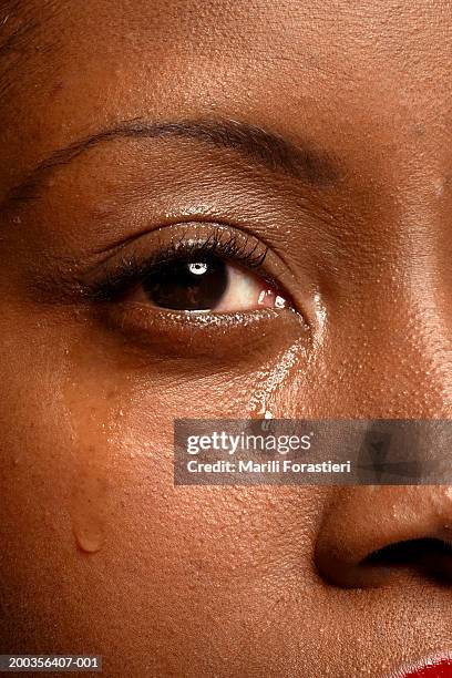 young woman crying, portrait, close-up - teardrop stock pictures, royalty-free photos & images