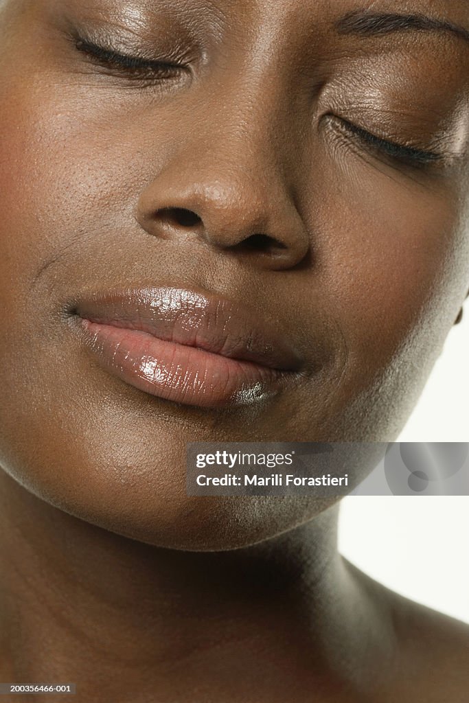 Young woman with eyes closed, close-up