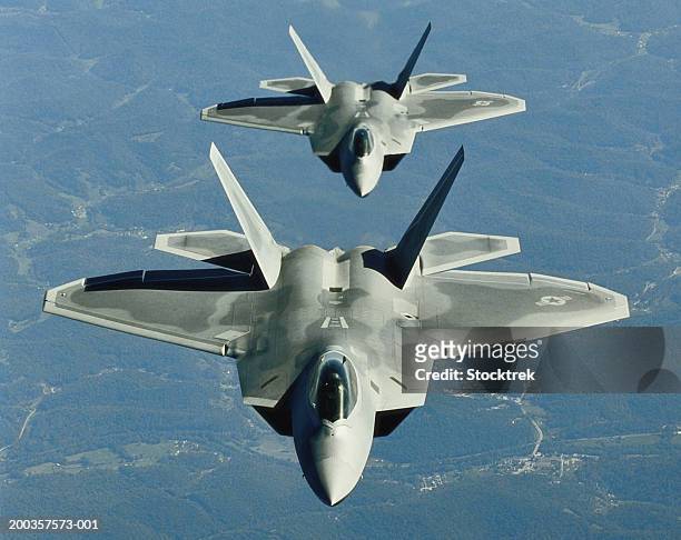 two f-15's in flight - military airplane - fotografias e filmes do acervo