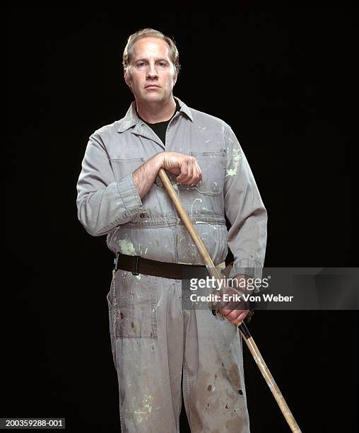 janitor with mop, portrait - bidello foto e immagini stock