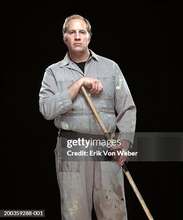 Janitor with mop, portrait