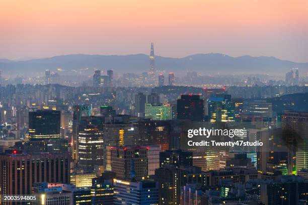 seoul city skyline view from inwangsan mountain in the morning - seoul south korea skyline stock pictures, royalty-free photos & images