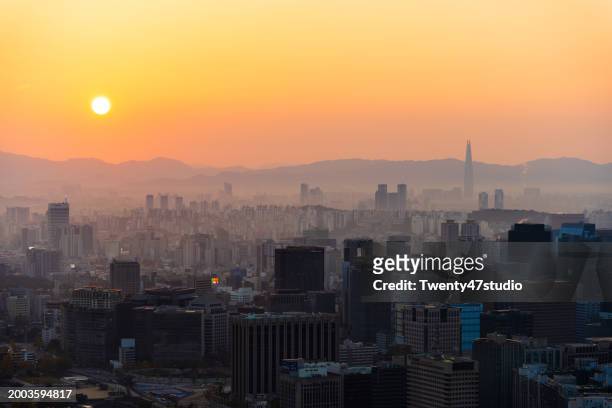 seoul city skyline view from inwangsan mountain in the morning - seoul south korea skyline stock pictures, royalty-free photos & images