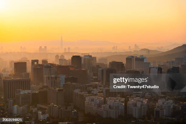 seoul city skyline view from inwangsan mountain in the morning - seoul south korea skyline stock pictures, royalty-free photos & images