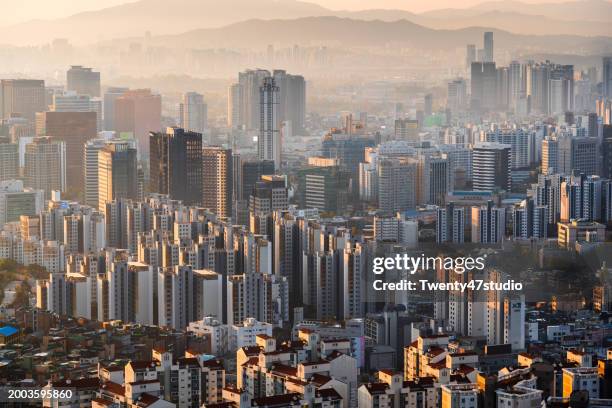 seoul city skyline view from inwangsan mountain in the morning - seoul south korea skyline stock pictures, royalty-free photos & images