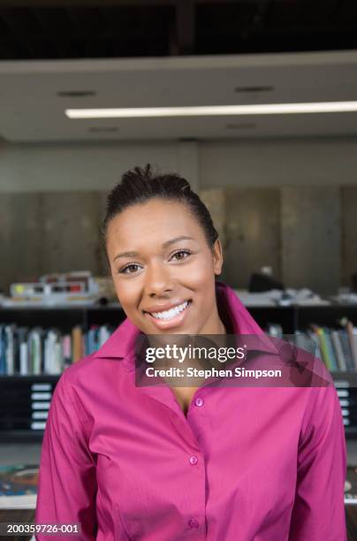 young businesswoman smiling, portrait - black shirt stock pictures, royalty-free photos & images