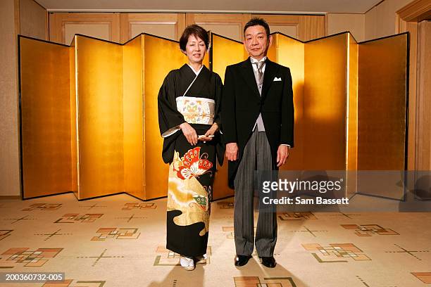 mature couple, woman in traditional dress, portrait - tail coat stock pictures, royalty-free photos & images