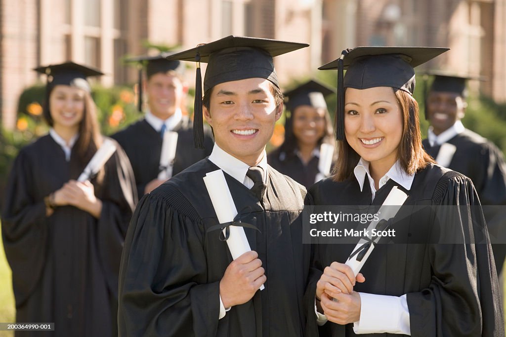 Graduates Group Of College Graduates Smiling Portrait High-Res Stock Photo ...