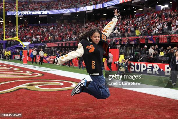 American Rapper Jay-Z's daughter, Blue Ivey Carter, reacts before Super Bowl LVIII between the San Francisco 49ers and Kansas City Chiefs at...