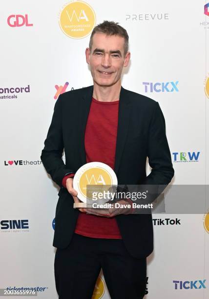 Rufus Norris poses in the Winners Room at The 24th Annual WhatsOnStage Awards 2024 at The London Palladium on February 11, 2024 in London, England.