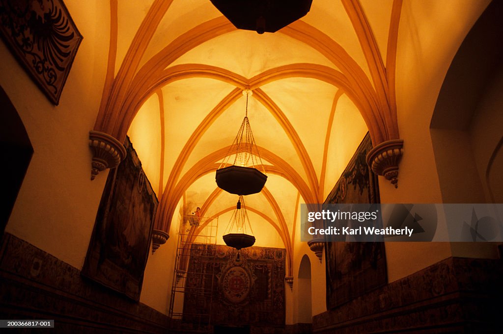 Historic ceiling, arches and chandeliers,  Alcazar, Sevilla, Spain, low angle view