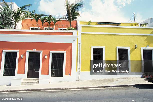 two colourful houses standing in row on sloping street, puerto rico - puerto rico road stock pictures, royalty-free photos & images